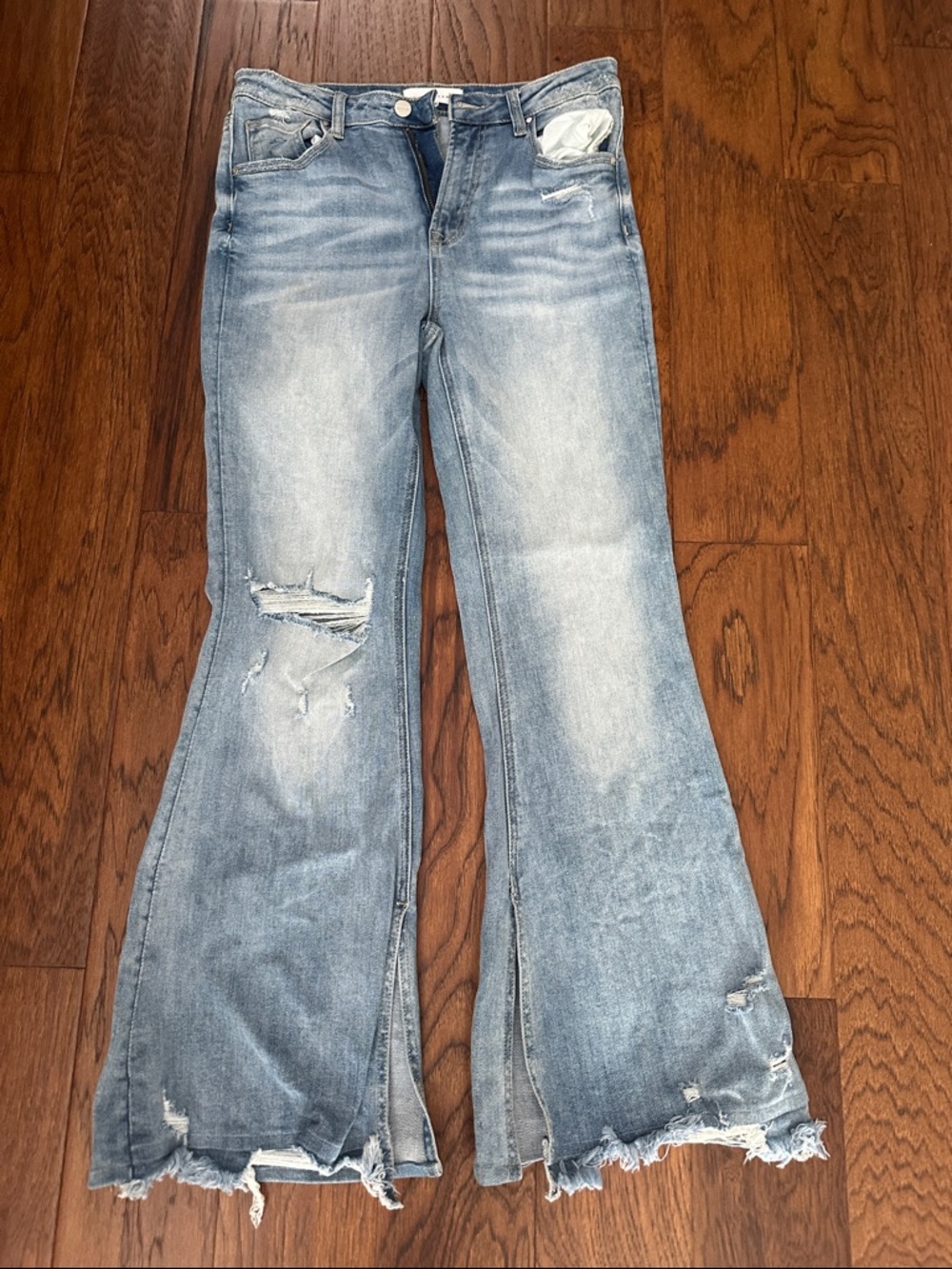 Risen Light Blue Flare Jeans with Raw Hem